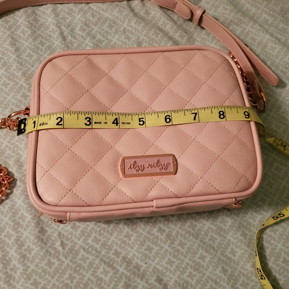 Itsy ritsy crossbody diaperbag